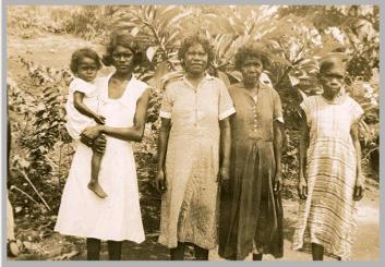 Aboriginal women and child in Lockhart River, Queensland, ca. 1930 (Attribute: State Library of Queensland)